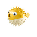 Fish-shaped TPR dog toy with treat dispensing function and bell sound for medium and large dogs