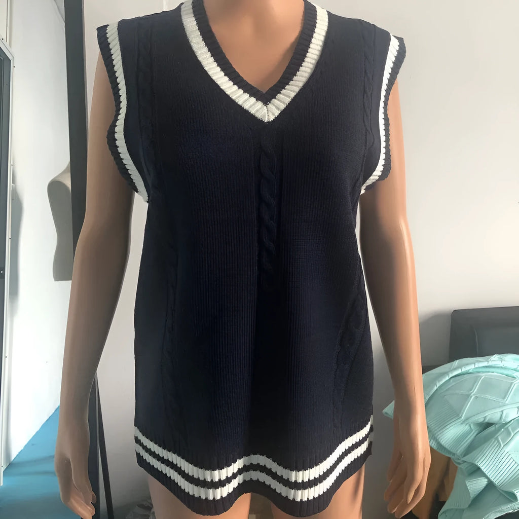 Women's slim-fit V-neck acrylic knitted sweater in striped stitch detail, shown in multiple colours.
