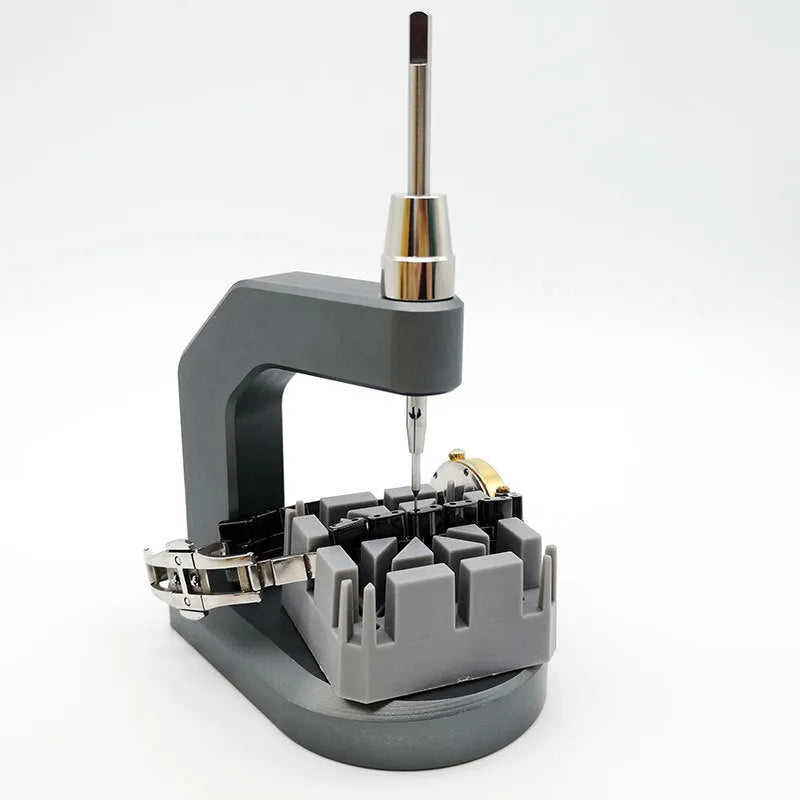 Silver multi-purpose press strap removal tool made of tool steel for watch and jewellery repair.