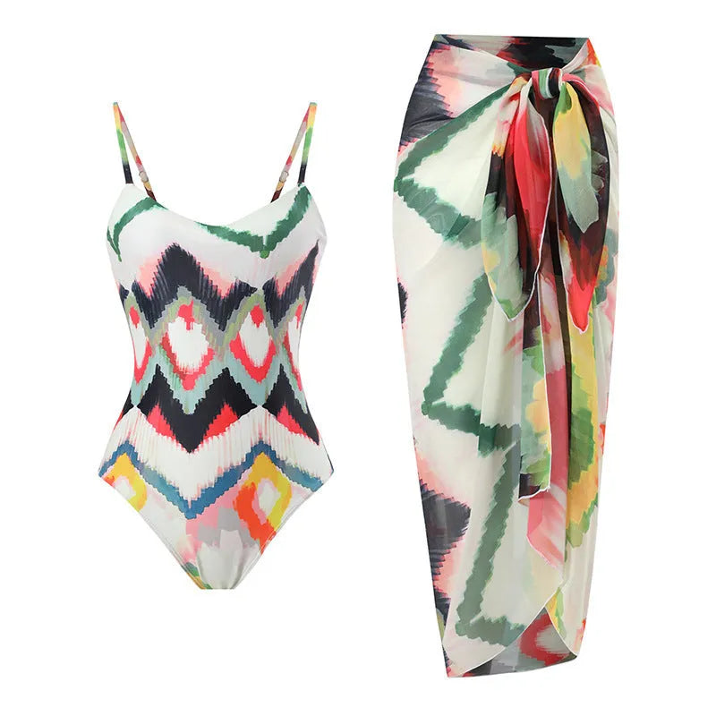 Women's printed two-piece swimsuit set with matching hip skirt in quick-dry polyester fabric