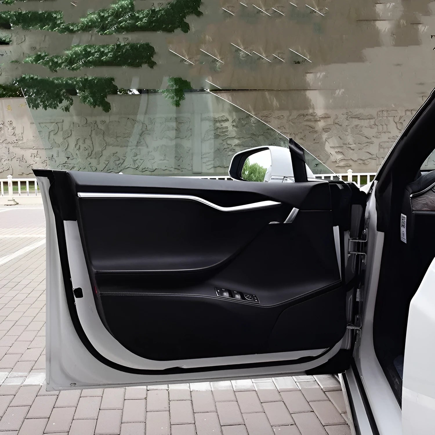 Carbon fibre anti-scratch protective film kit for Tesla Model S car doors.