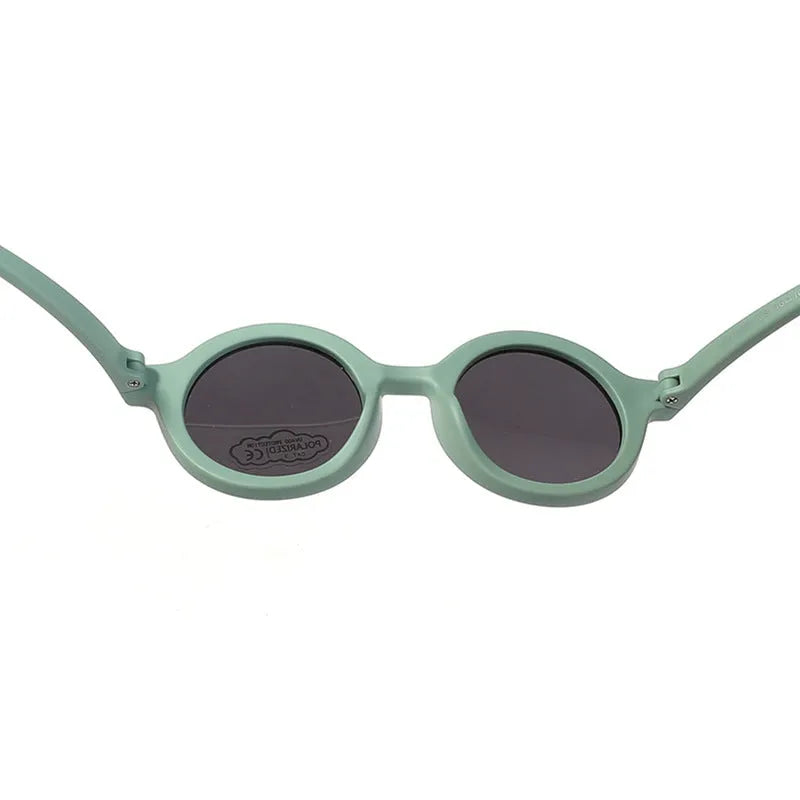 Children's round frame silicone sunglasses with UV400 protection for 0-3 year olds in multiple colour options