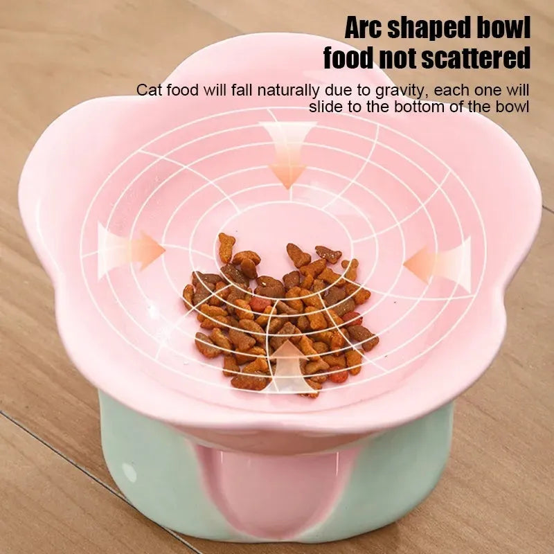 Blue ceramic elevated pet bowl with floral pattern and non-slip base for cats and small dogs