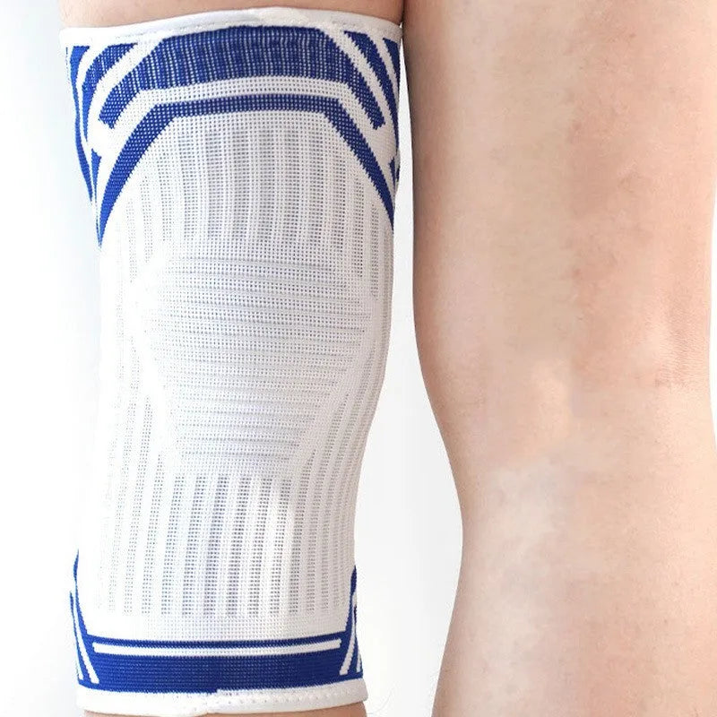 Adult knee pads in blue, made from breathable cotton with high elasticity, for sports use.