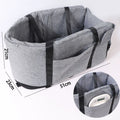 Blue cloth dog kennel with mesh ventilation panel for car travel and outdoor use.