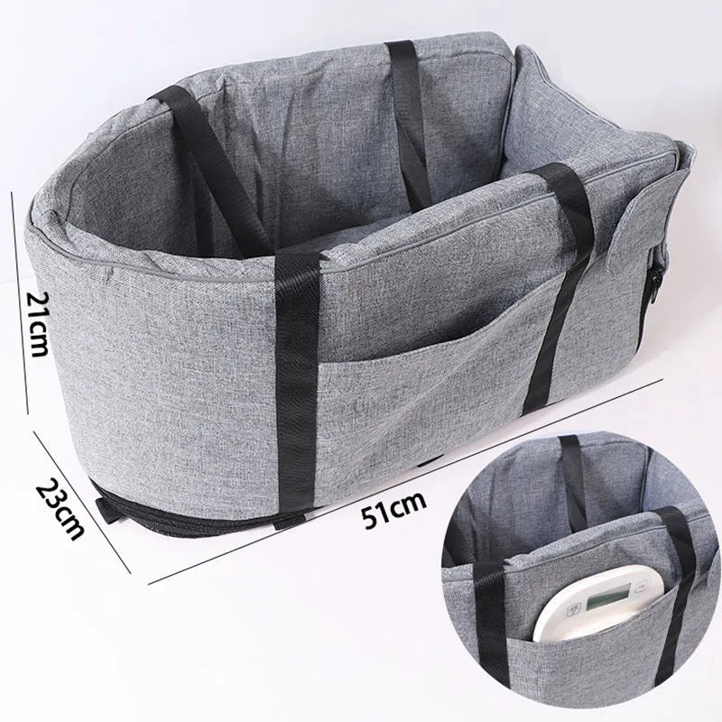 Blue cloth dog kennel with mesh ventilation panel for car travel and outdoor use.