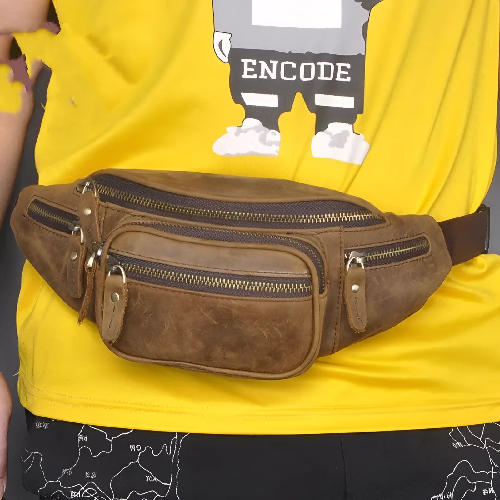 Retro brown leather messenger bag with single shoulder strap shown open.
