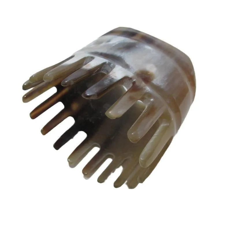 White buffalo horn meridian massage comb with wide teeth and pointed acupressure tips