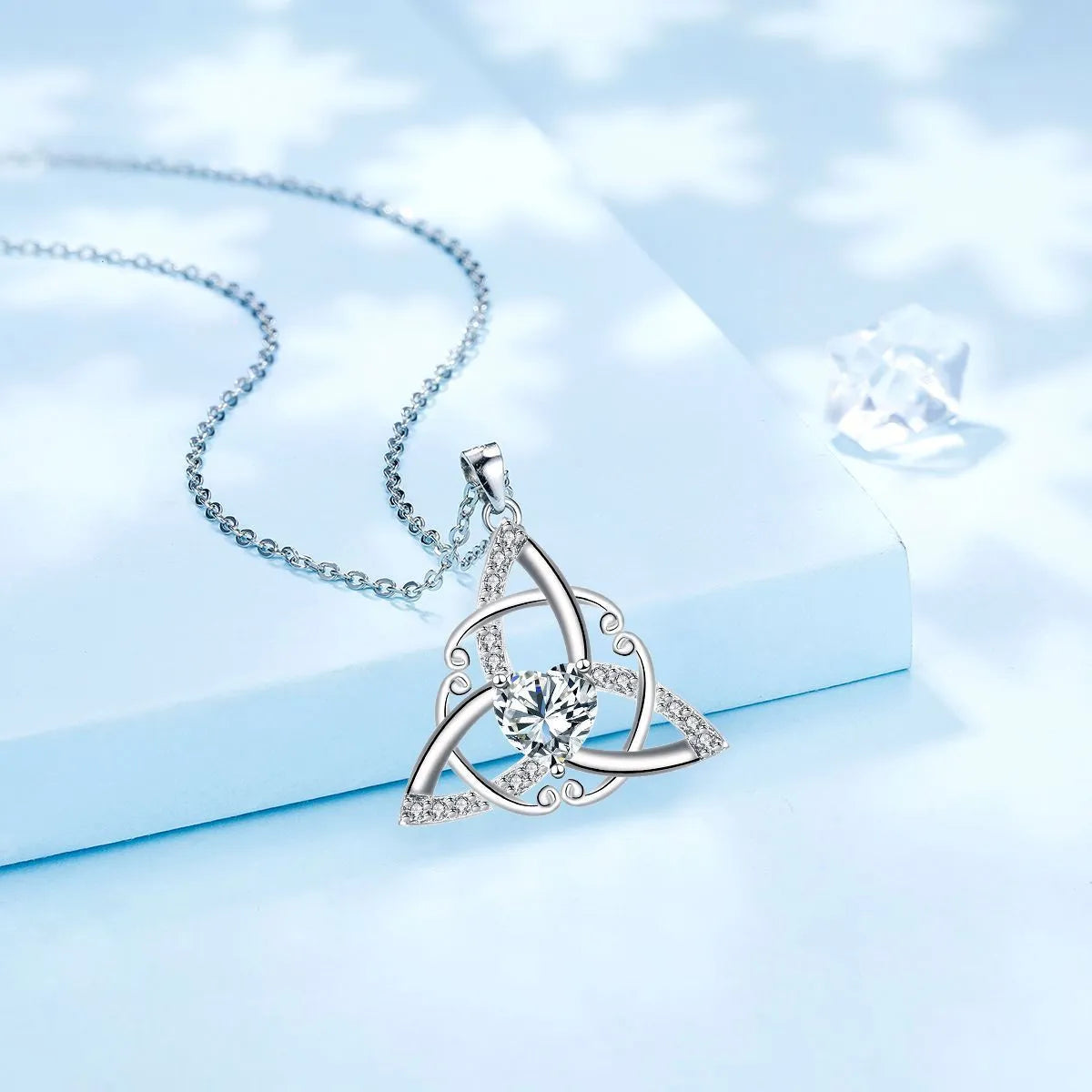 Geometric Celtic knot copper necklace for women in an electroplated blue colour finish.