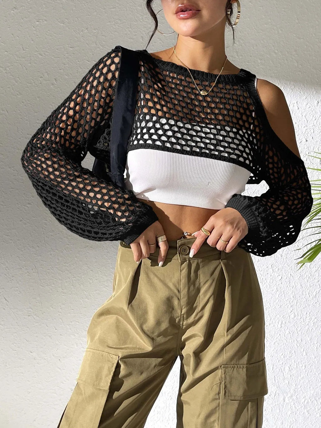 Mesh shirt with hollowed navel design in polypropylene fibre available in six colour options