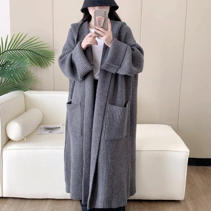Women's loose hooded cardigan coat in acrylic fibre with 80cm length and raglan sleeves