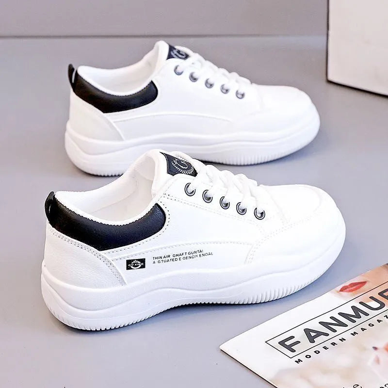Women's white Korean-style leather pumps with cross-strap detailing and lace-up front