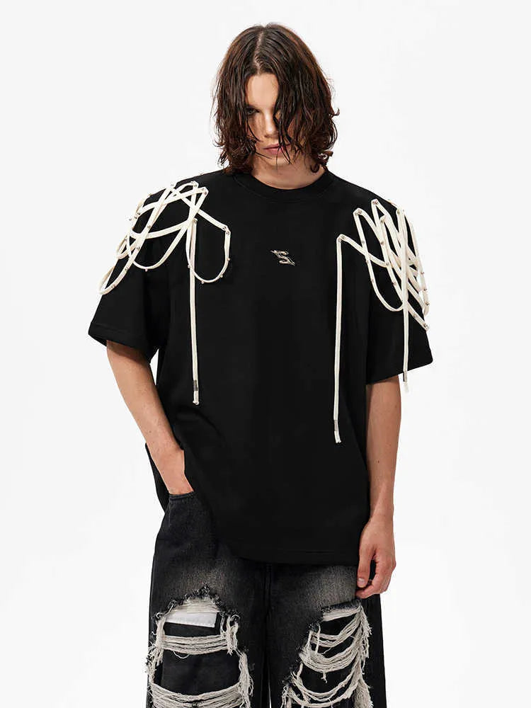 Black women's short-sleeve T-shirt with rivet ribbon detail on padded shoulder.