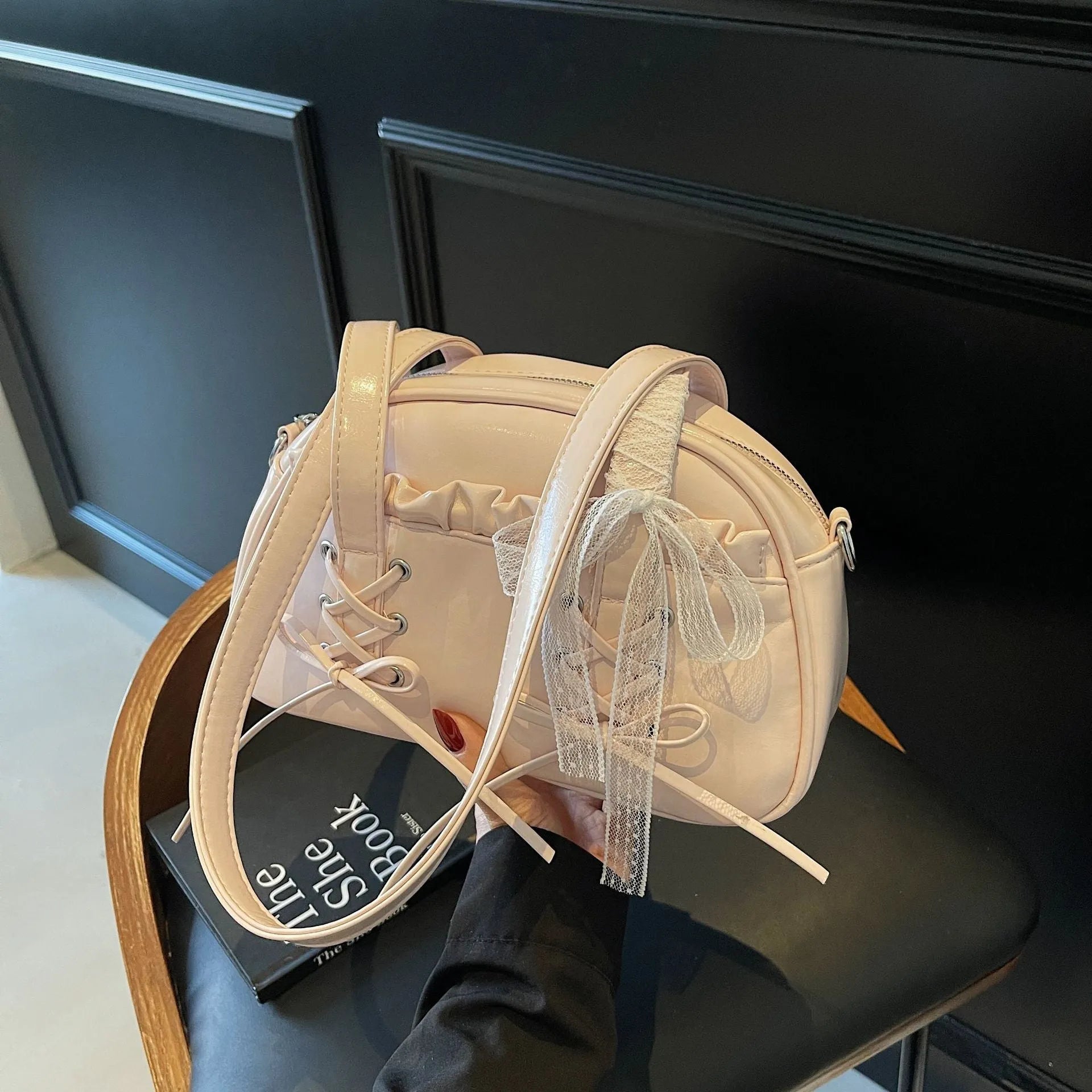 Women's PU bandage bow handbag in milky white with shoulder strap and sewing thread detailing