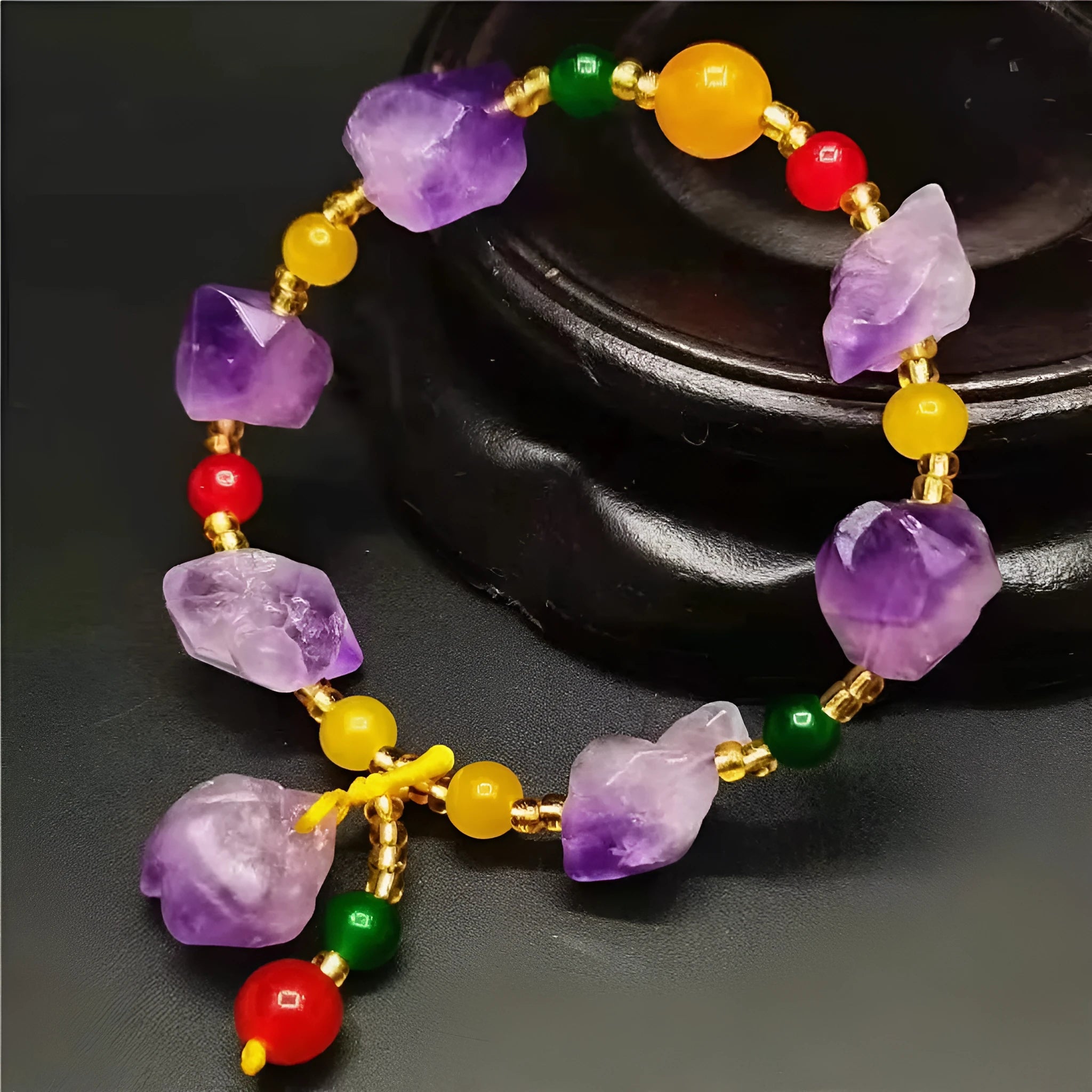 Natural shaped purple amethyst bead bracelet for women with a fu charm.