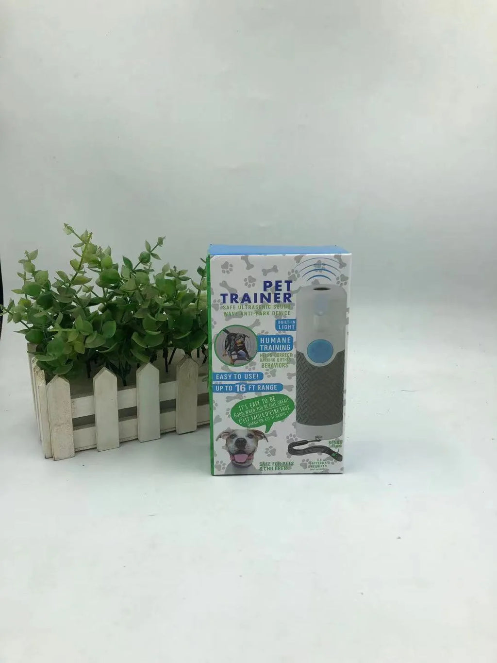 White handheld ultrasonic dog trainer device for bark control
