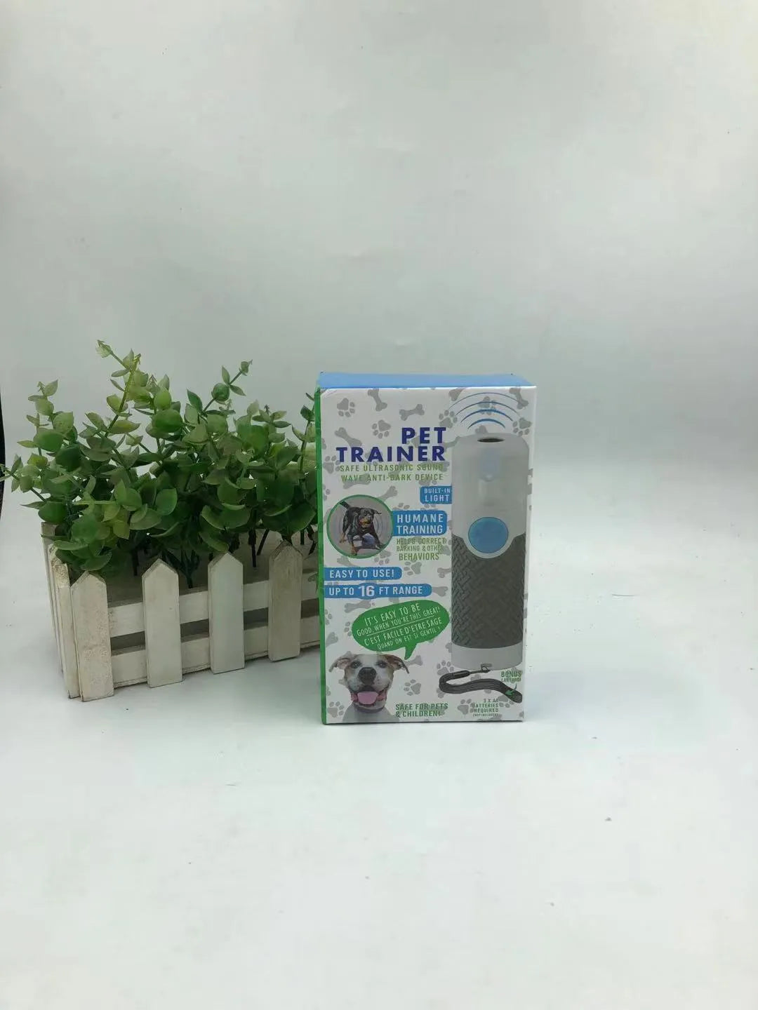 White handheld ultrasonic dog trainer device for bark control