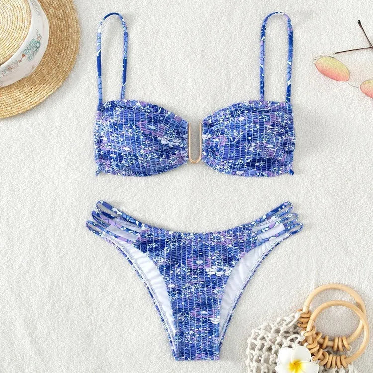 Women's high-waisted floral bikini swimsuit in blue, orange, pink, or rose red on a mannequin