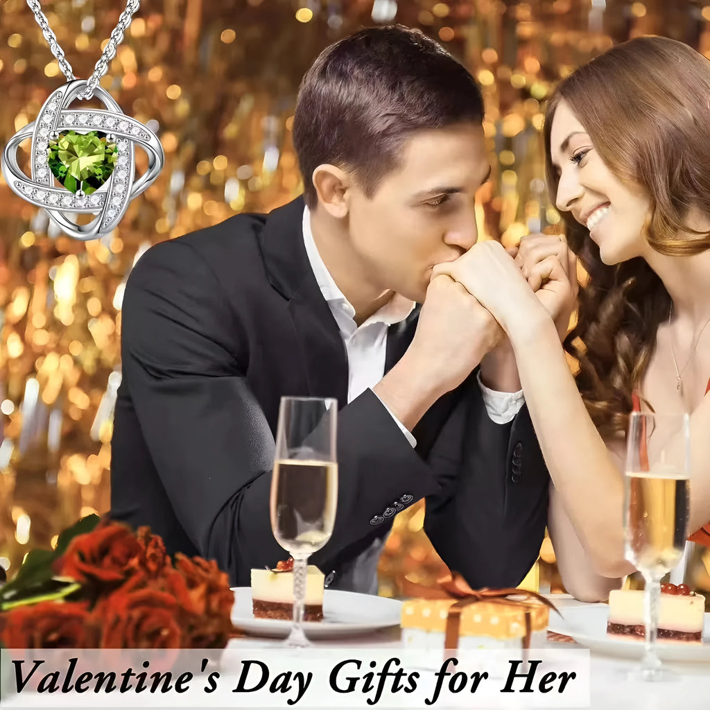 Ladies heart shape necklace in platinum electroplated colours including red diamond and dark blue diamond.