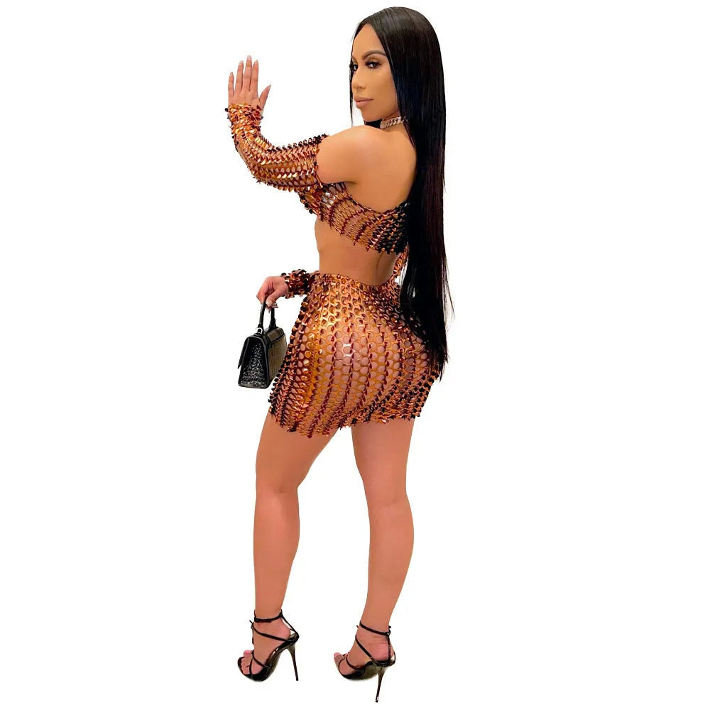 Women's black hollow-out net dress two-piece set with sleeveless top and short skirt.