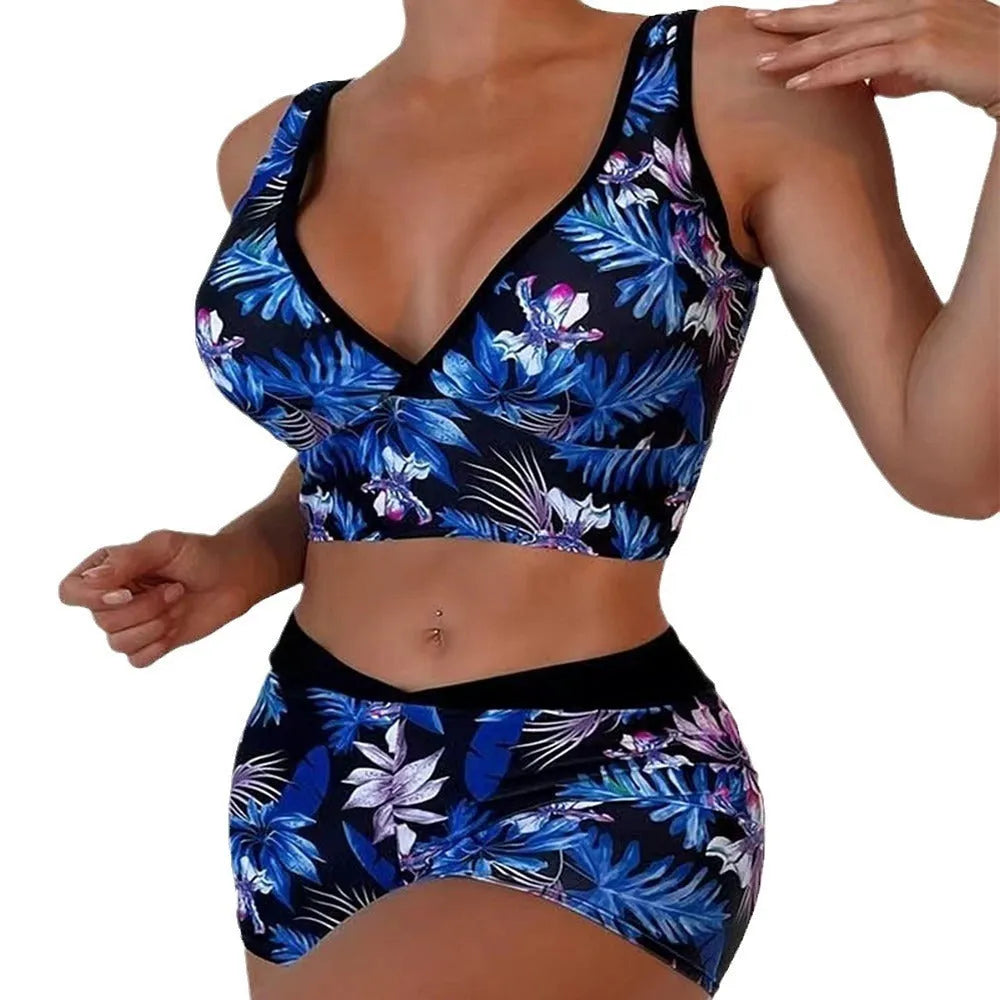 Women's two-piece swimsuit set with printed boxer briefs and sleeveless top on a hanger.