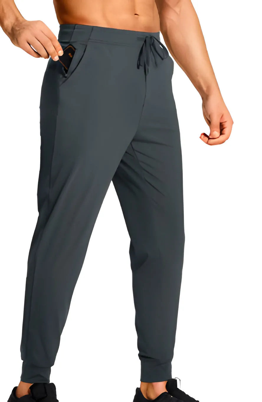 Men's loose casual trousers in solid colour polyester fabric available in multiple sizes