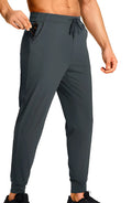 Men's loose casual trousers in solid colour polyester fabric available in multiple sizes