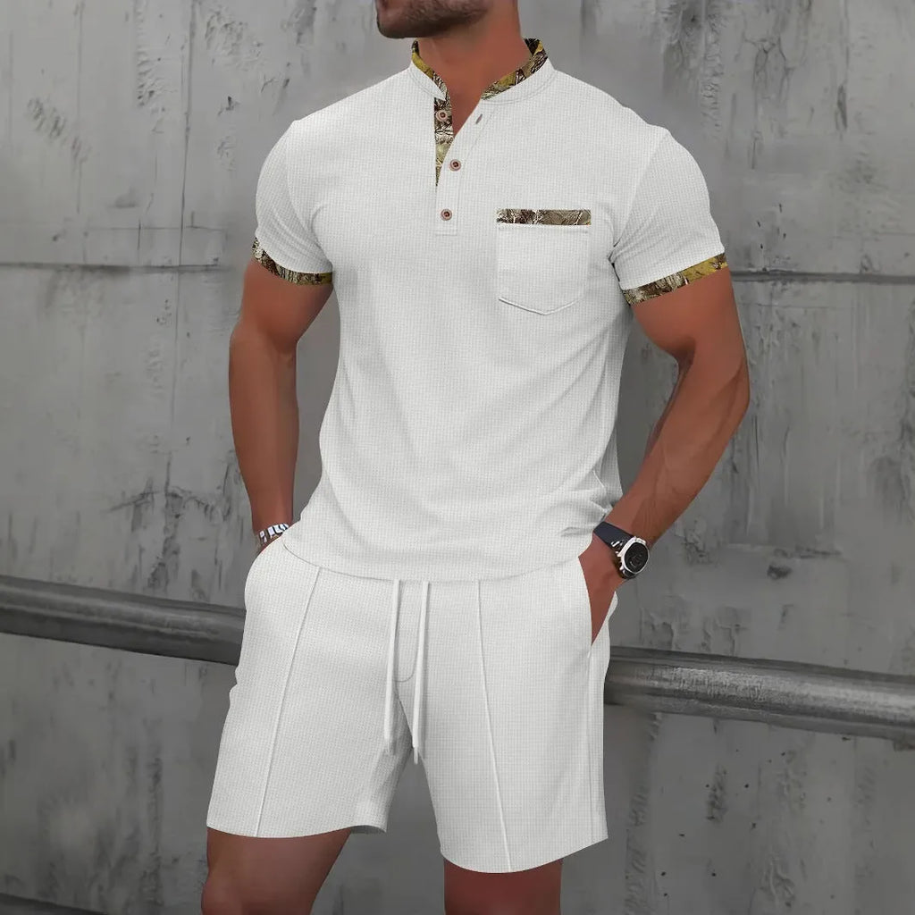 Man wearing grey waffle texture short sleeve polo with zip front and matching shorts