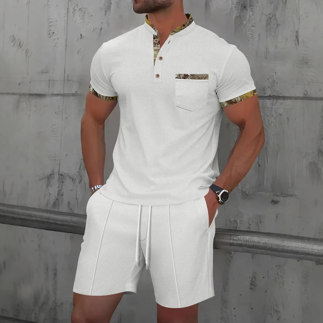 Man wearing grey waffle texture short sleeve polo with zip front and matching shorts