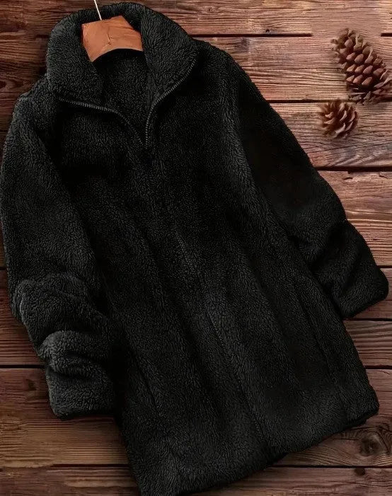 Double-sided fleece jacket in black, navy blue, or khaki colour on a hanger.