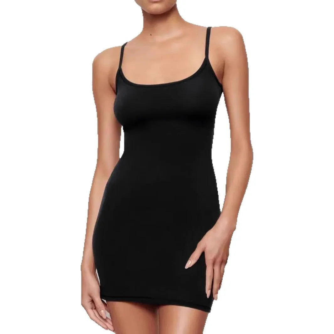 Black sling dress with skinny sheath silhouette and sleeveless design