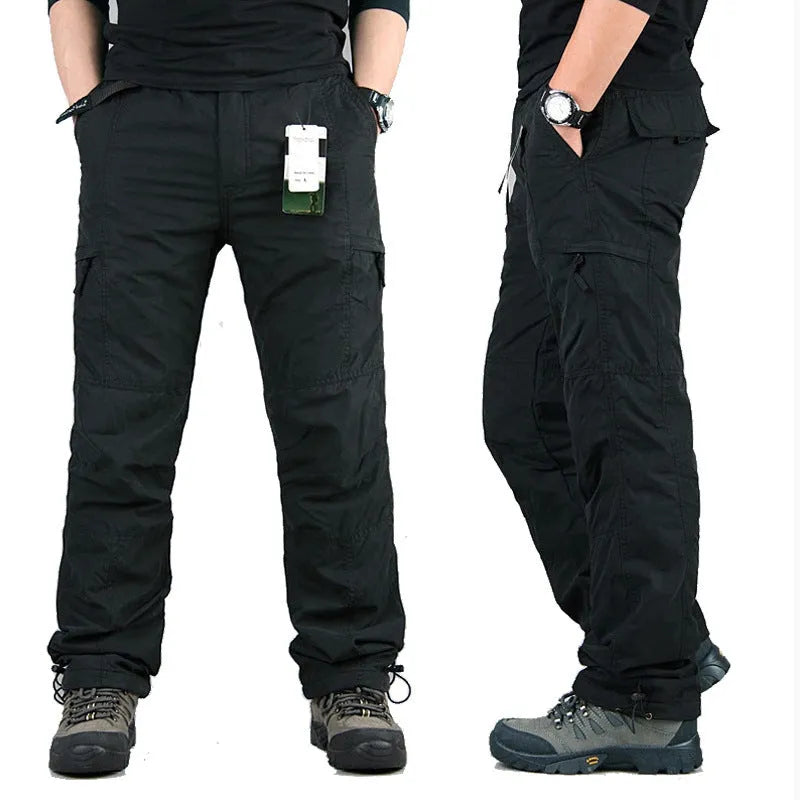 Men's khaki velvet cotton overalls with a wool lining, showing loose straight-leg fit and stonewash texture.