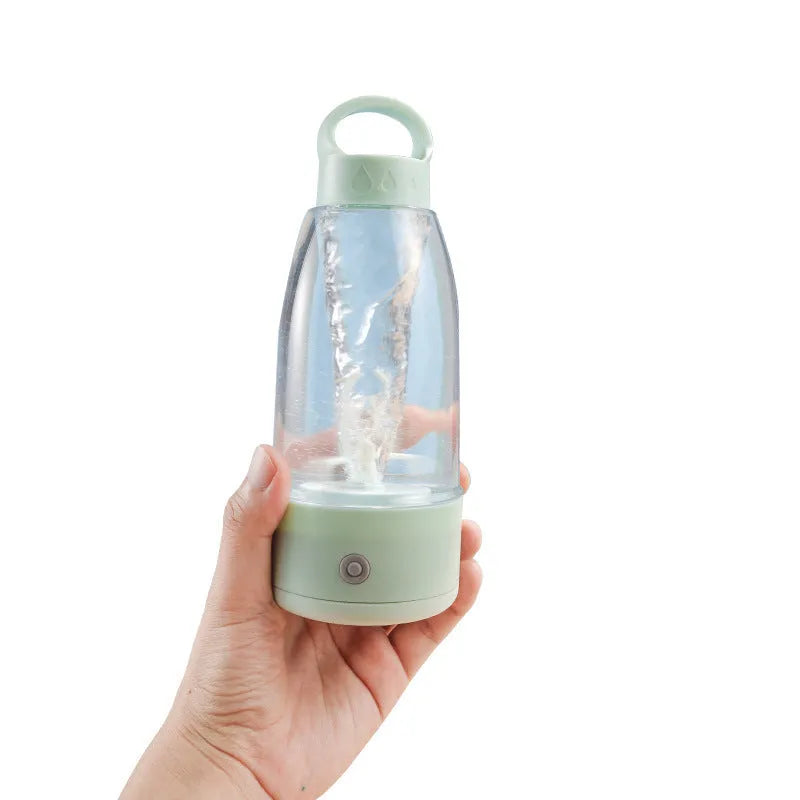 Automatic electric shaker bottle in green, pink, or white with handle and USB charging port.