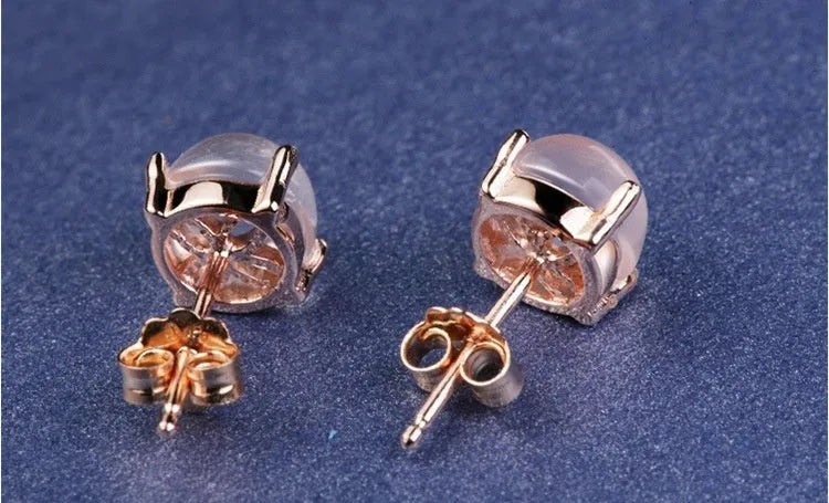 Women's Korean style drop-shaped stud earrings with synthetic Ross quartz stones in rose gold plating