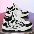 Men's white chunky sneakers with thick rubber sole, synthetic leather upper, and front lace-up.