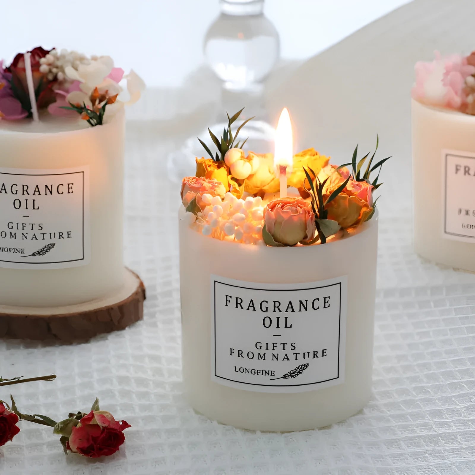 330g aromatherapy candle with embedded dried flowers, available in nine fragrances with optional gift box and wooden base