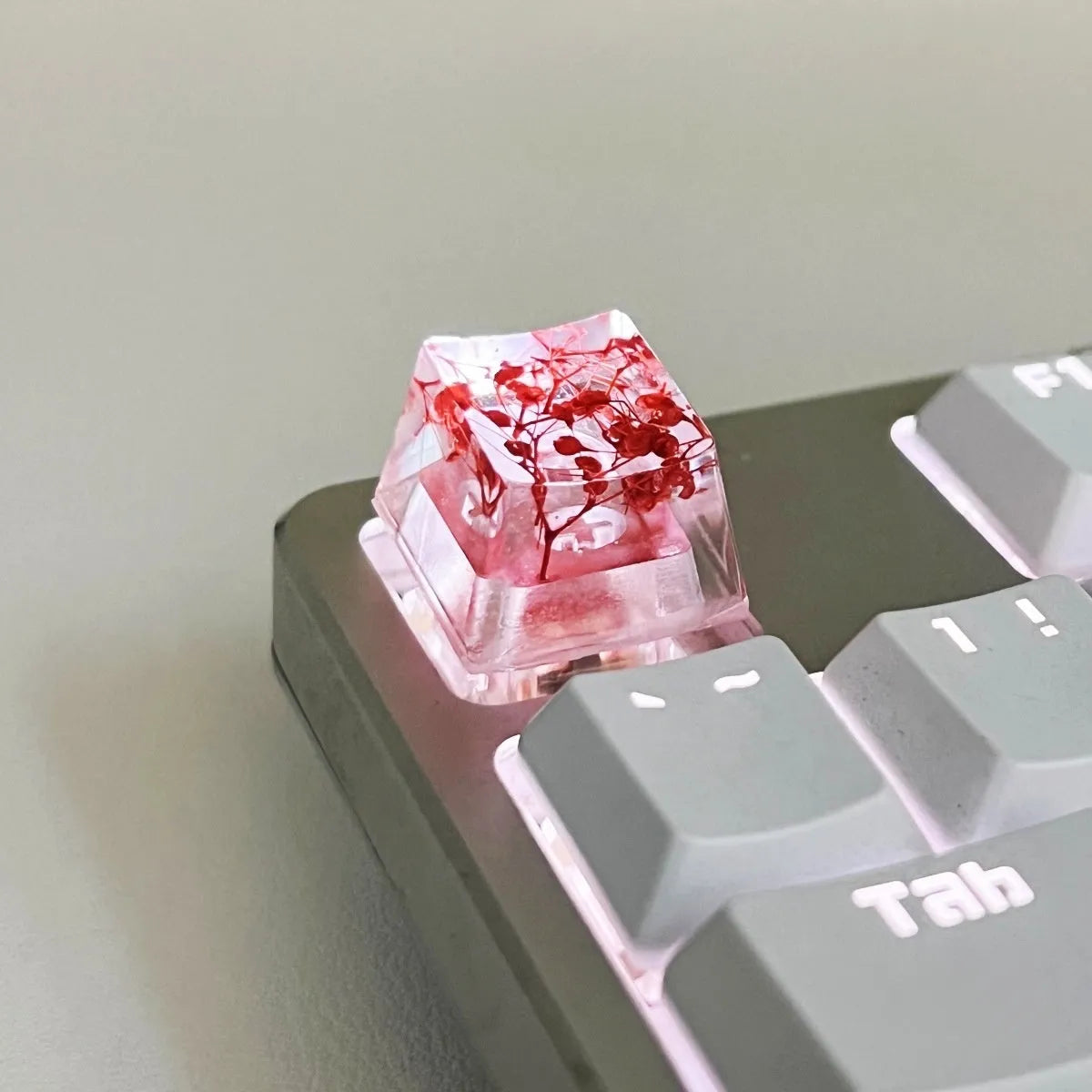 A high-transparency resin mechanical keyboard keycap with a starry sky design, shown in a choice of colours.