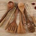 Seven wooden cooking utensils including spoons and shovels with non-slip handles
