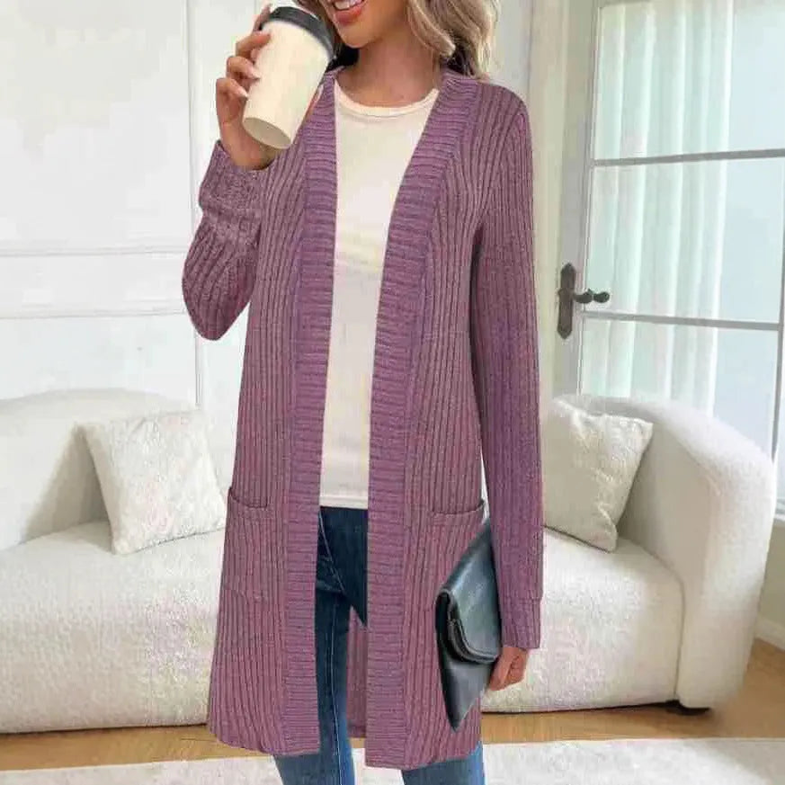 Long sleeve loose fit knitted cardigan jacket with pockets in grey.