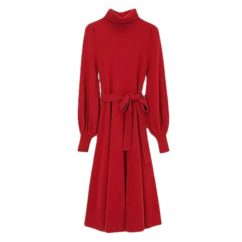 Rose red knitted turtleneck pullover dress with long sleeves and a loose, mid-length skirt with an elasticated waist.