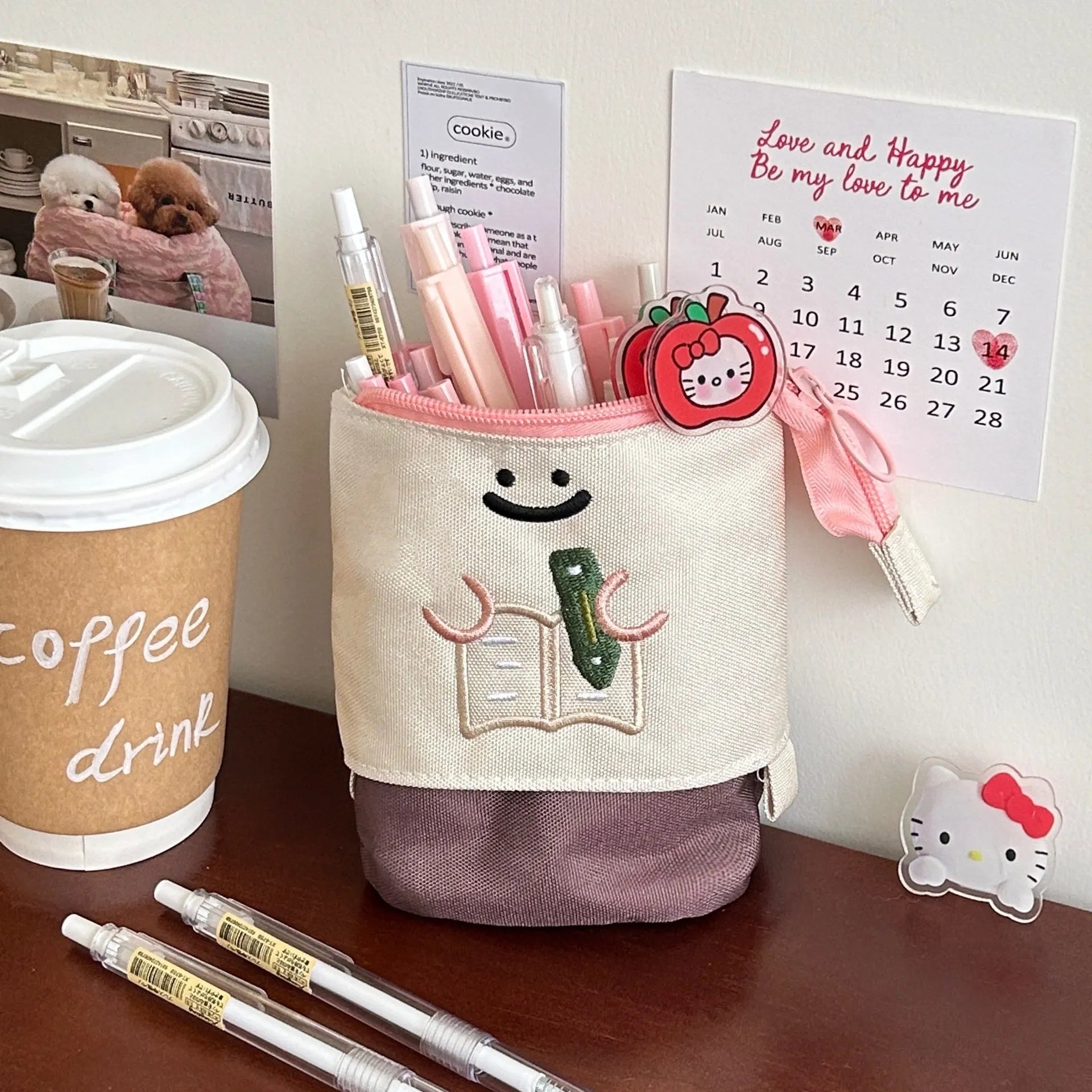 Brown Korean style cartoon print collapsible pencil case with zipper, lying flat.