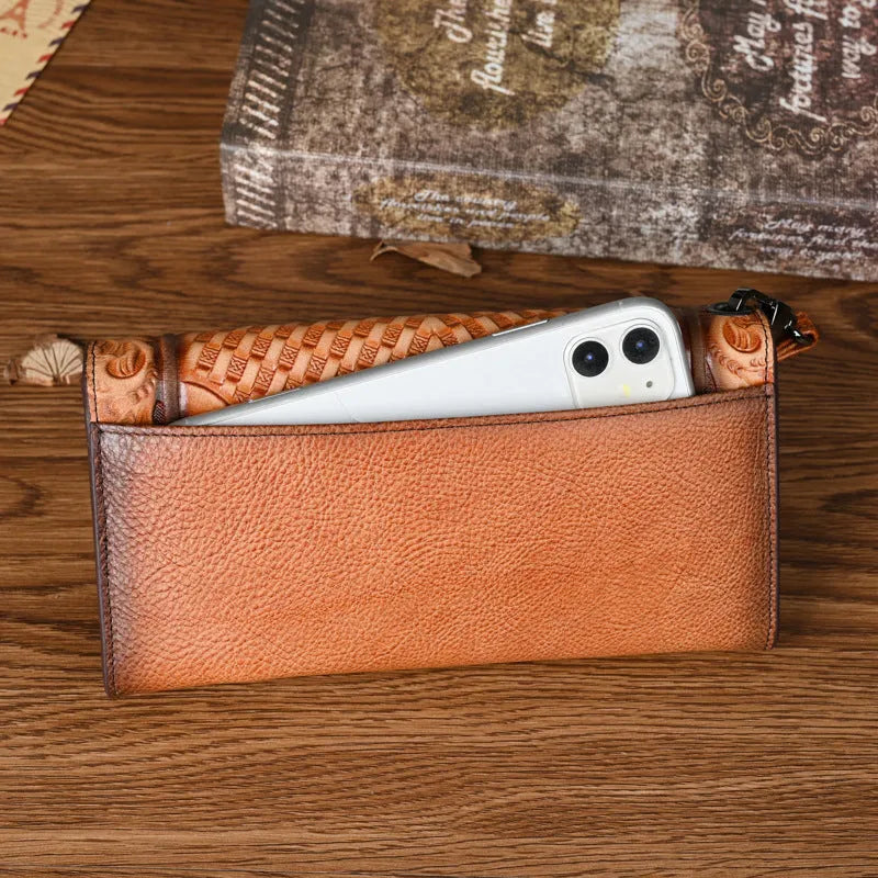 Retro brown women's tri-fold wallet with an embossed Chinese floral pattern, showing card slots and a coin compartment.