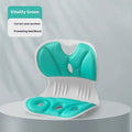 Solid colour memory foam lumbar support cushion with fixing band on a chair.