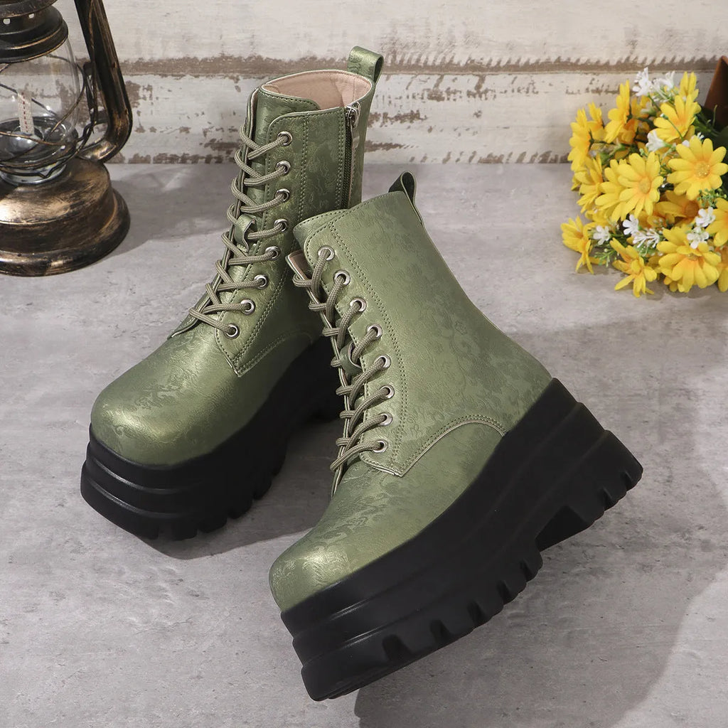 Women's white retro platform Martin boots with a chunky heel and side zipper on a neutral background.