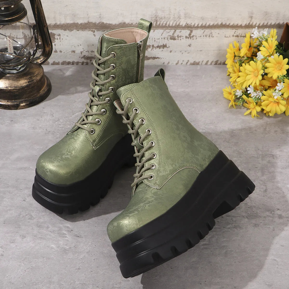 Women's white retro platform Martin boots with a chunky heel and side zipper on a neutral background.