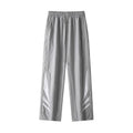 Men's straight cut loose fit casual trousers in black or grey, laid flat.