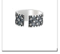 Adjustable pure silver ring with a geometric multi five-pointed star design on a silver band