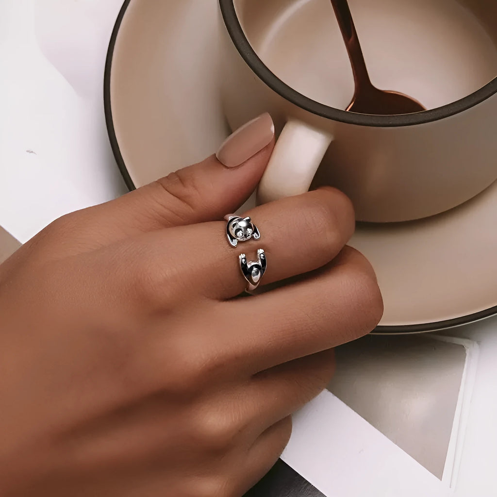 Adjustable panda open ring bracelet in sterling silver with white gold plating showing animal design