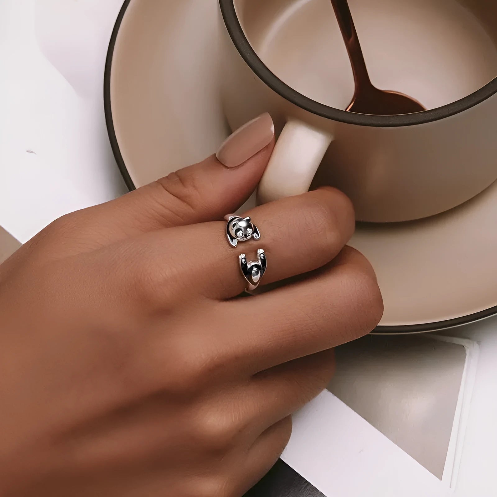 Adjustable panda open ring bracelet in sterling silver with white gold plating showing animal design