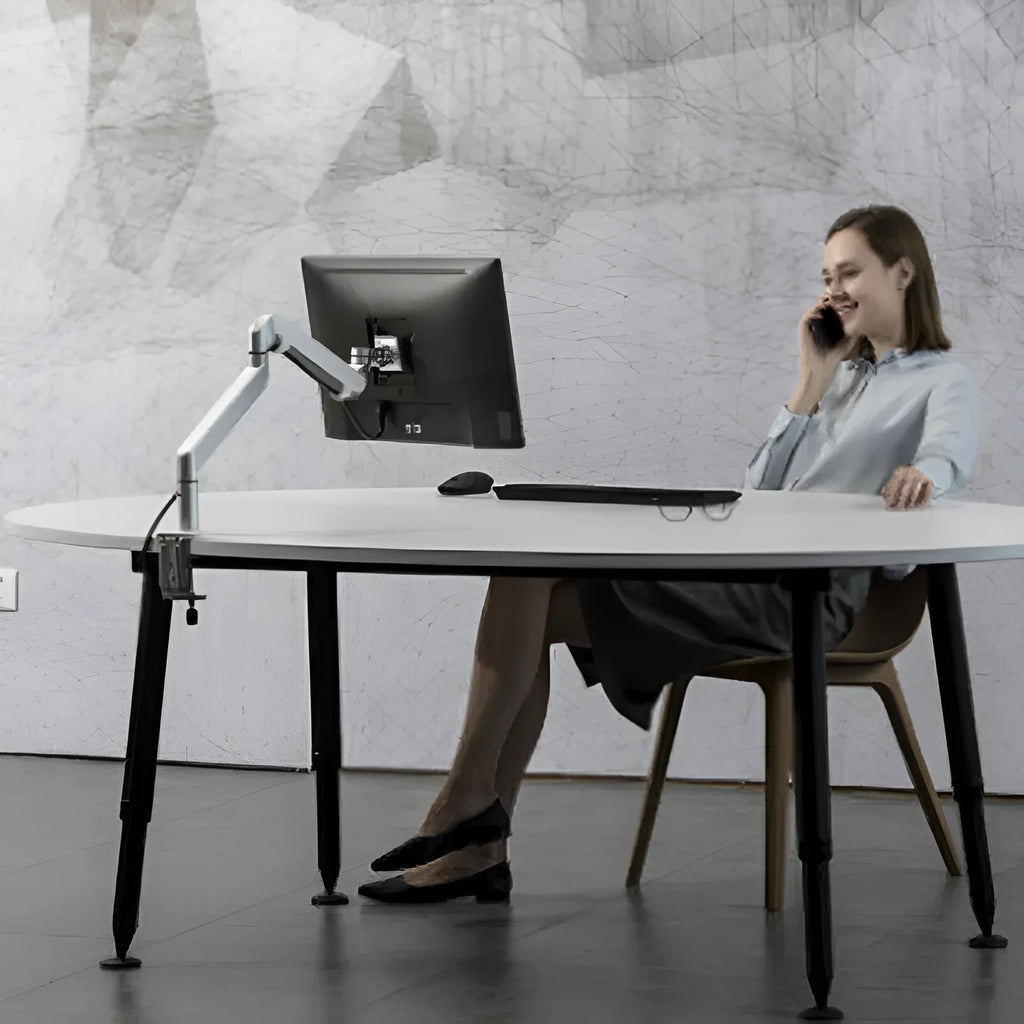 Silver aluminium VESA laptop mounting bracket with adjustable air pressure arm mechanism